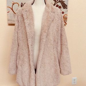 Furry coat with cheetah print lining
